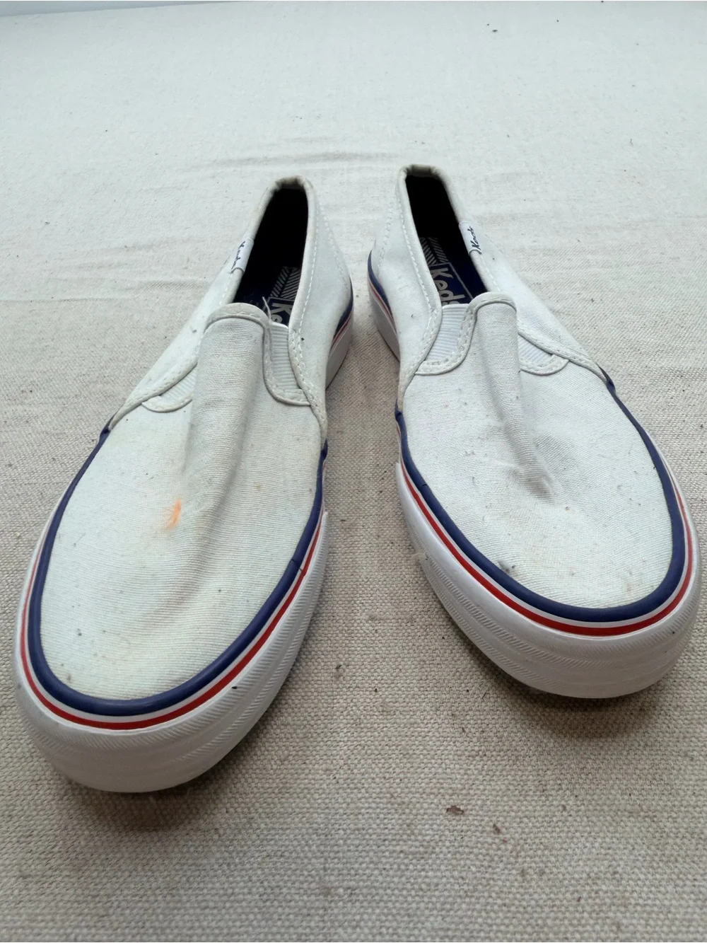Keds White Canvas Slip-On Loafers with Red & Blue Trim